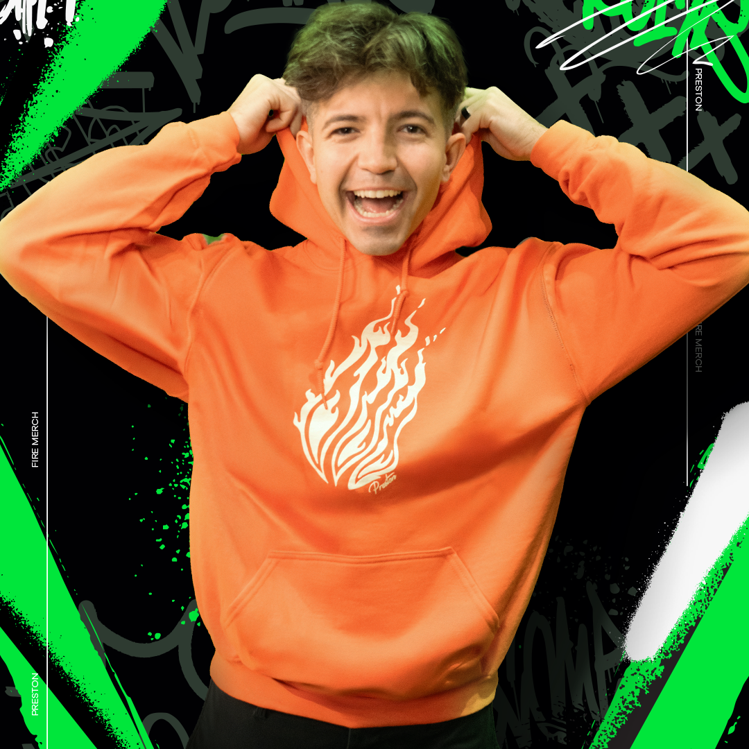 Person wearing an orange hoodie with a flame design against a colorful, abstract background
